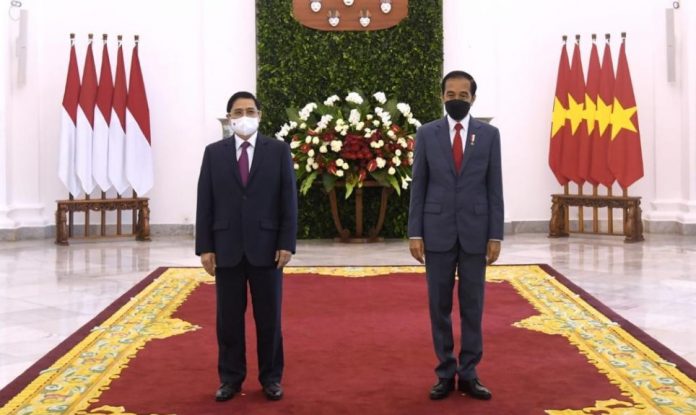 Presiden RI Joko Widodo (Jokowi) dan Perdana Menteri (PM) Vietnam Pham Minh Chinh