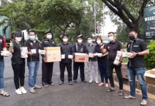BMTI Kota Batam dan Hulubalang, Bagikan Ribuan Nasi Kotak Kepada Pengendara BMTI dan Hulubalang Batam