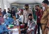 Kapolres Natuna Dampingi Bupati Beserta Rombongan Tinjauan pelaksanaan Vaksinasi di Kecamatan Subi
