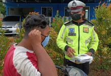 Satlantas Polres Bintan Beri Imbauan dan Bagikan Masker ke Masyarakat Pengguna Jalan Satlantas Polres Bintan Beri Imbauan dan Bagikan Masker