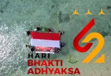 Hari Bhakti Adhyaksa ke 62, Kacabjari Natuna di Tarempa Kibarkan Bendera Bawah Laut