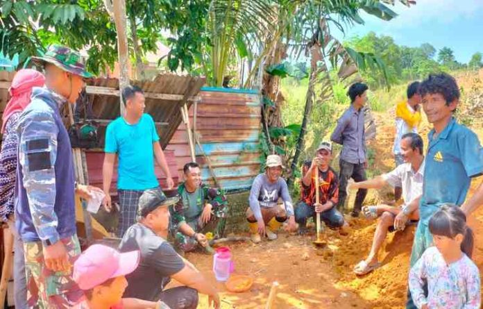 Personel TMMD dan Warga Kavling Seraya Sambau Rayakan Hari Kebangkitan Nasional Dengan Sukacita