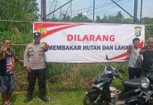 Polres Bintan Sosialisasi Dengan Pemasangan Sepanduk Larangan Membakar Hutan Dan Lahan