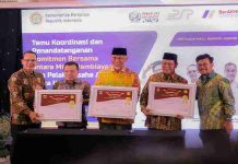 Bupati H.Benny Utama Hadiri Penandatanganan Komitmen Bersama dan Penyerahan Simbolis KUR Pertanian