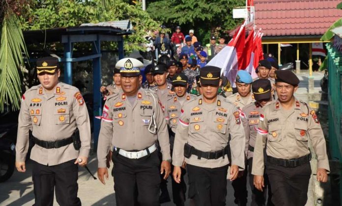 Polres Anambas Kirab dan Upacara Pengibaran Bendera Bersama TNI