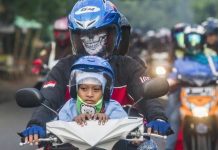 Apakah Boleh Bonceng Anak di Depan saat Mengendarai Motor Apakah Boleh Bonceng Anak di Depan saat Mengendarai Motor