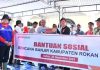 BRK Syariah Serahkan Bantuan Sembako kepada Korban Banjir di Desa Pekan Tebih, Rokan Hulu BRK Syariah Serahkan Bantuan Sembako kepada Korban Banjir di Desa Pekan Tebih, Rokan Hulu
