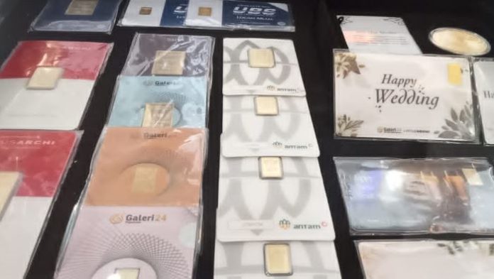 Emas Pegadaian Galeri24 Turun, Harga Emas Antam Stagnan