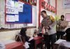 Polres Pasaman Barat Membagikan Ratusan Paket Makan Siang Bergizi Gratis Untuk Pelajar SD Negeri 09 Pasaman