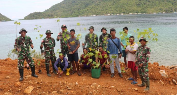 TMMD ke-128 Anambas, TNI dan Warga Tanam Kemiri di Jalur Penghubung Mubur Kecil–Bayat