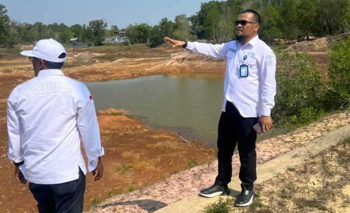 Minimnya curah hujan selama musim kemarau membuat kondisi Waduk Tempan Minimnya curah hujan selama musim kemarau membuat kondisi Waduk Tempan